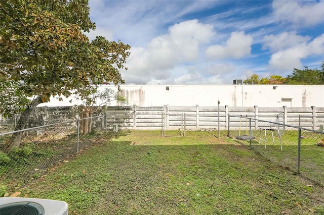 view of yard featuring central AC unit