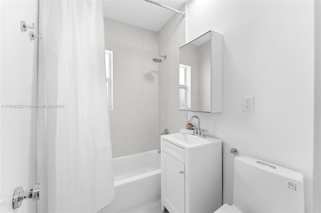 full bathroom featuring vanity, toilet, and shower / bath combo