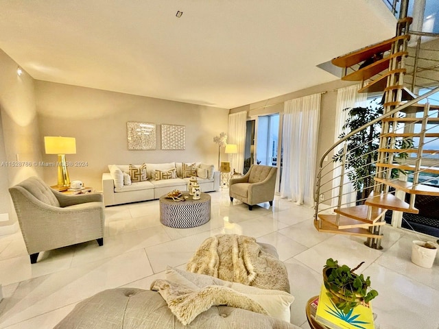 living room featuring light tile flooring