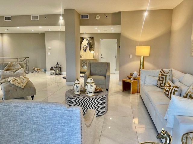 living room with light tile flooring