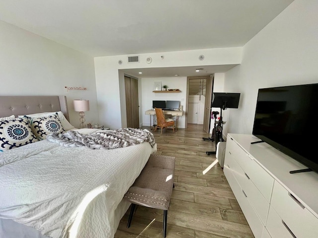 bedroom featuring light hardwood / wood-style flooring