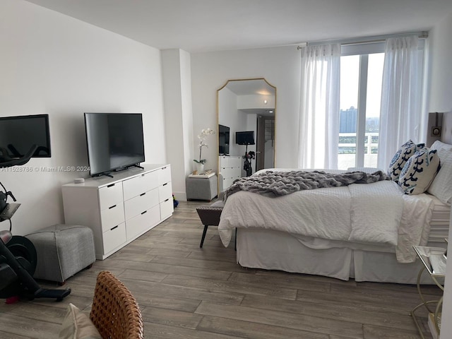 bedroom with light wood-type flooring