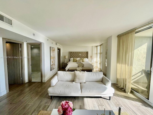 bedroom featuring light wood-type flooring