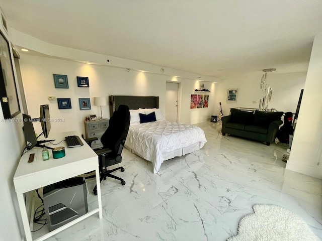 bedroom featuring light tile floors