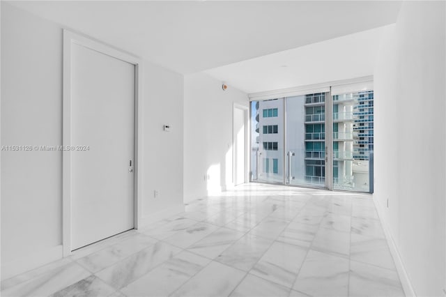 view of tiled spare room