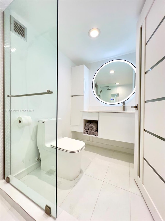 bathroom with tile floors and toilet