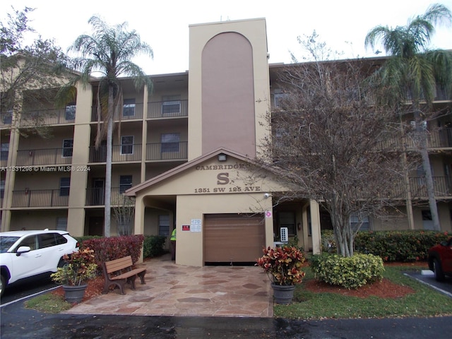 view of building exterior with a garage