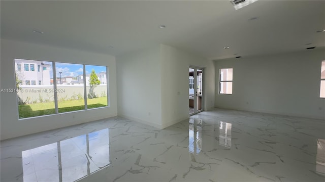 view of tiled spare room