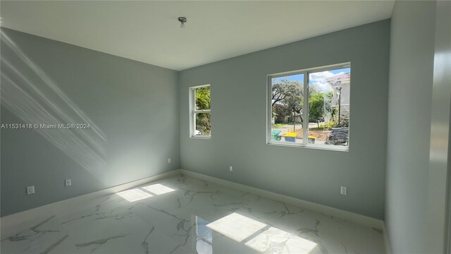 view of tiled empty room