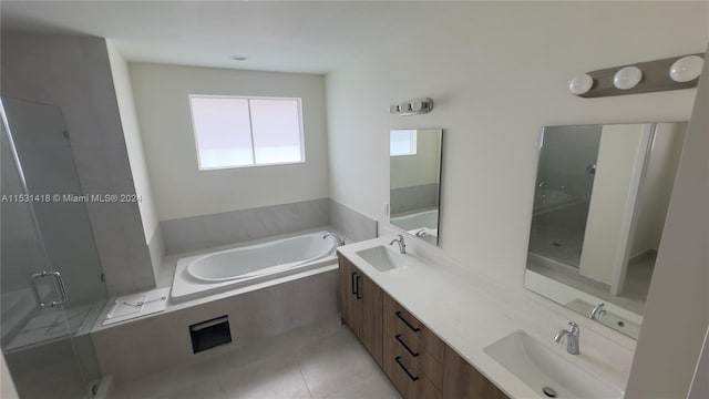 bathroom featuring dual bowl vanity, tile flooring, and plus walk in shower