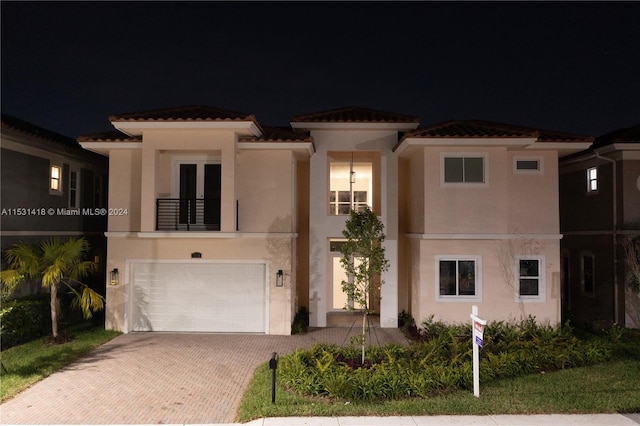 view of front of property with a garage