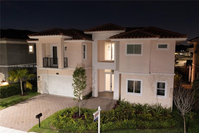 view of front of home with a garage