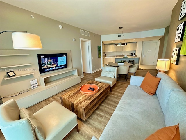 living room featuring light hardwood / wood-style floors