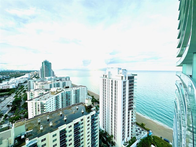 property's view of city with a beach view and a water view