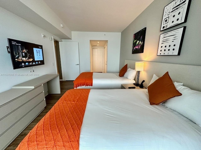 bedroom featuring dark hardwood / wood-style flooring