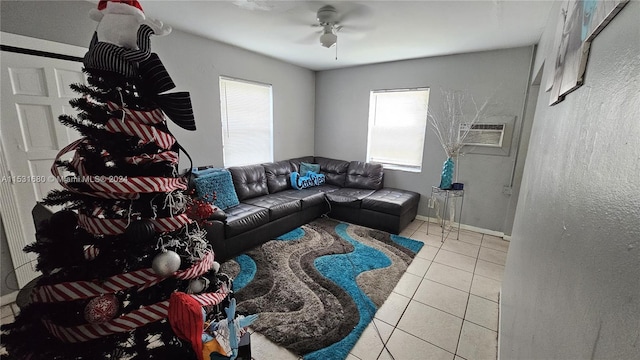 tiled living room with plenty of natural light, ceiling fan, and an AC wall unit