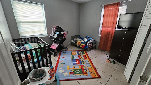 game room with light tile floors