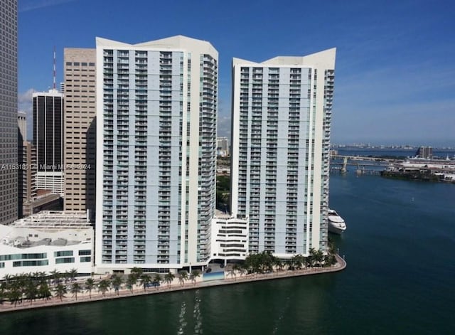 view of building exterior with a water view