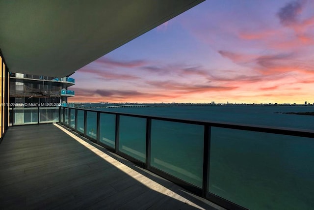 view of balcony at dusk