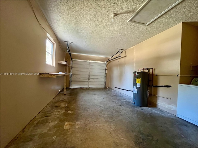 garage with washer / dryer and electric water heater