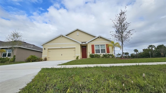 craftsman-style house with a front yard and a garage