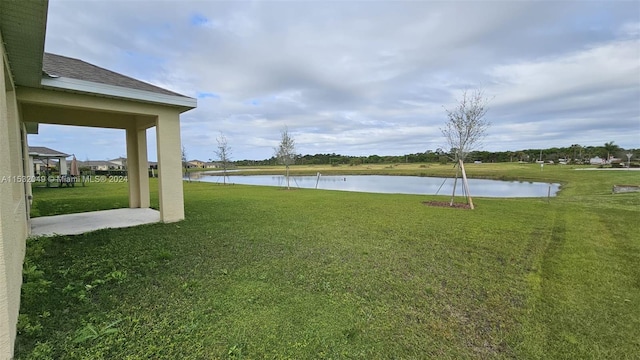 view of yard with a water view