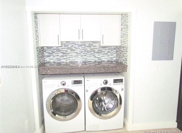 laundry area featuring independent washer and dryer