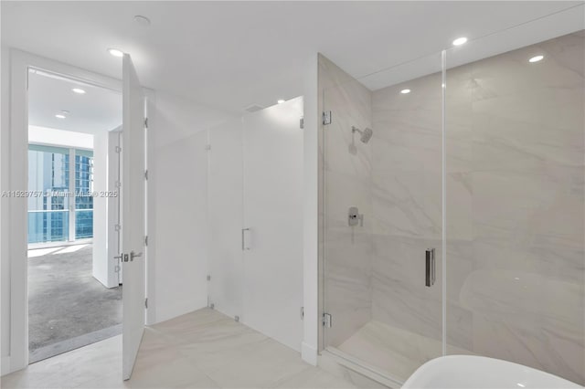 bathroom featuring an enclosed shower