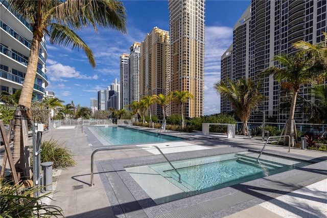 view of pool featuring a patio area