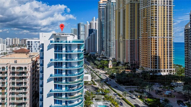 property's view of city with a water view