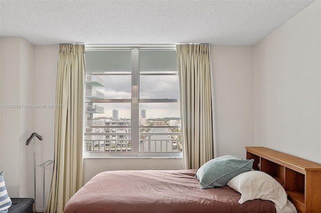 bedroom featuring a textured ceiling