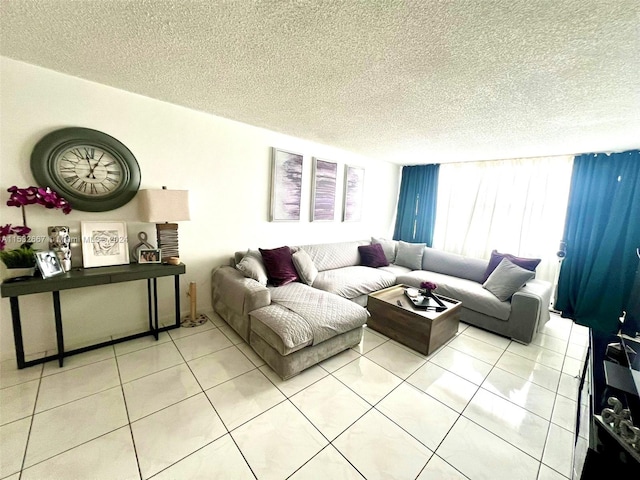 tiled living room featuring a textured ceiling