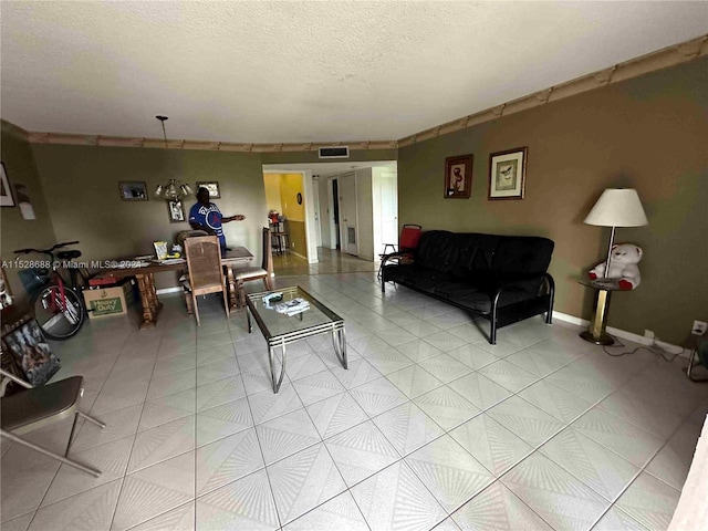 living room featuring a textured ceiling