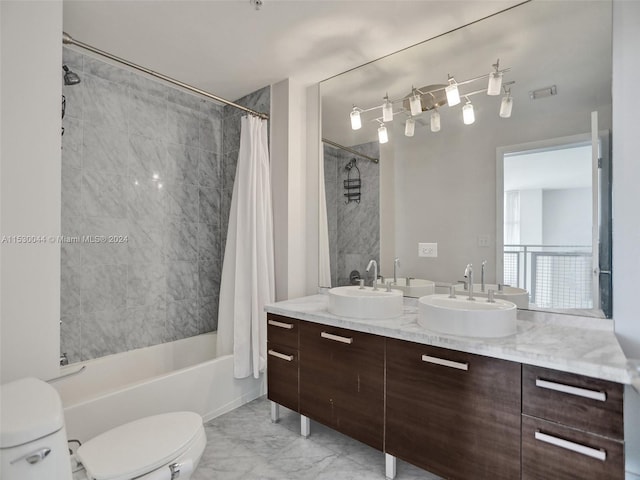 full bathroom with dual bowl vanity, tile flooring, toilet, and shower / bath combo with shower curtain