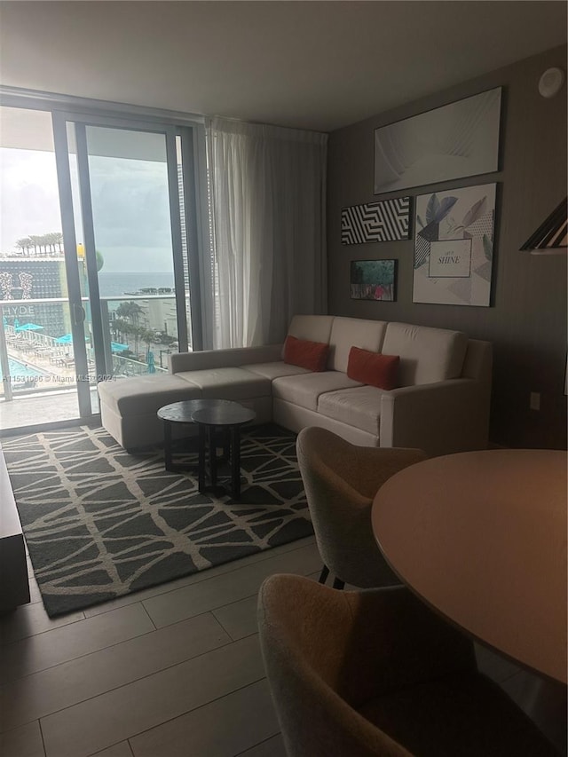 living room with floor to ceiling windows