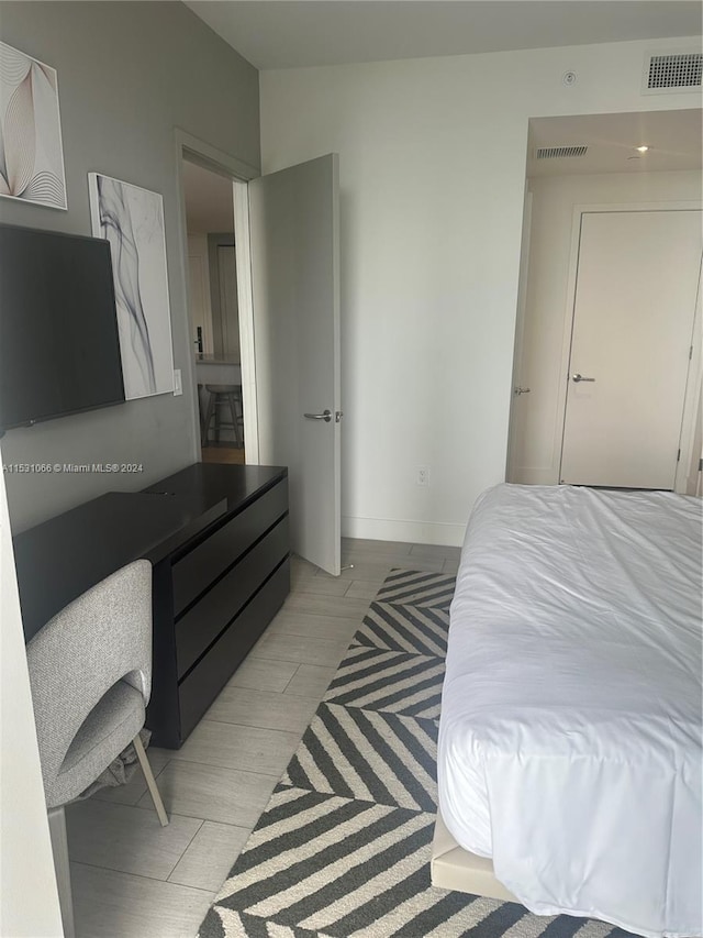 bedroom featuring light hardwood / wood-style flooring