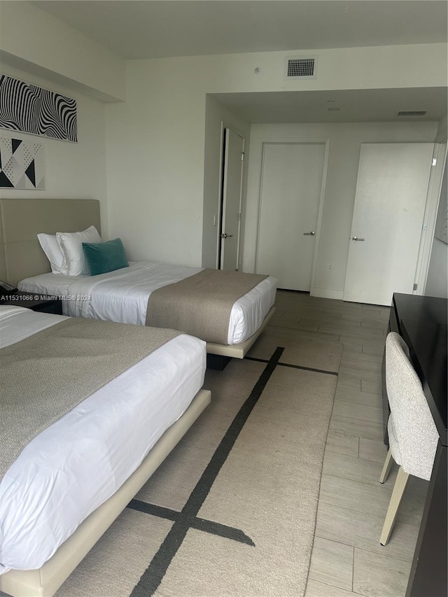 bedroom featuring hardwood / wood-style flooring