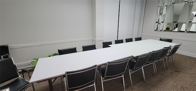 view of carpeted dining area