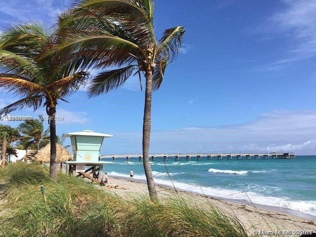 view of water feature featuring a beach view