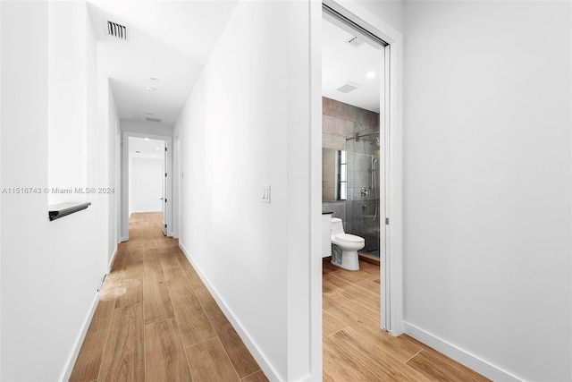 hall featuring light wood-type flooring