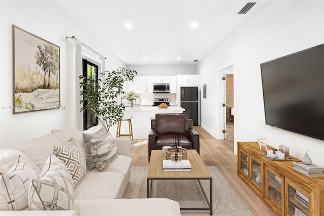 living room featuring light hardwood / wood-style floors