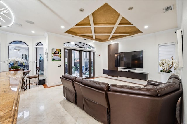 living room with coffered ceiling, ornamental molding, and light tile floors