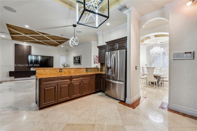 kitchen with a chandelier, coffered ceiling, decorative light fixtures, kitchen peninsula, and stainless steel fridge