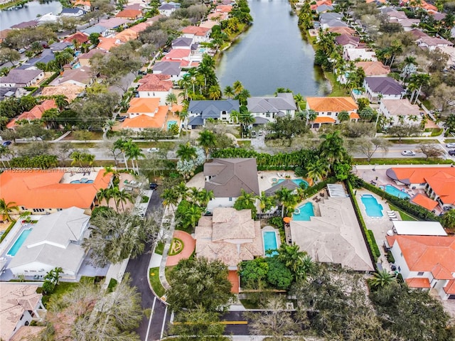 birds eye view of property featuring a water view