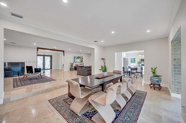 living room featuring crown molding