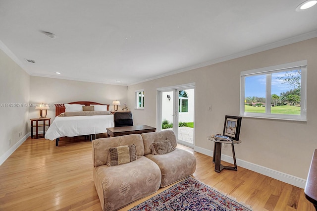 bedroom with ornamental molding, light hardwood / wood-style floors, and access to outside