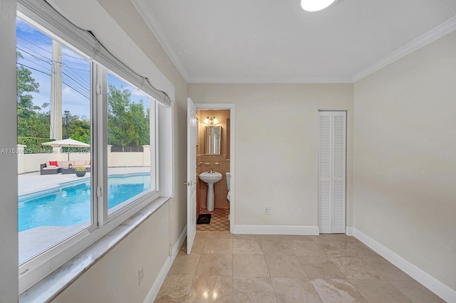 interior space with crown molding