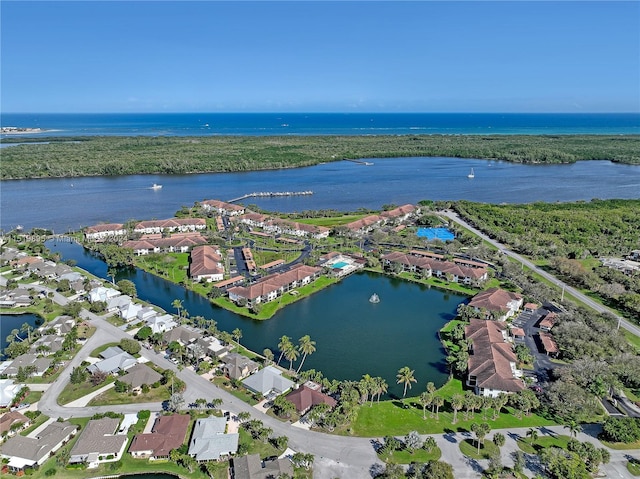 bird's eye view with a water view