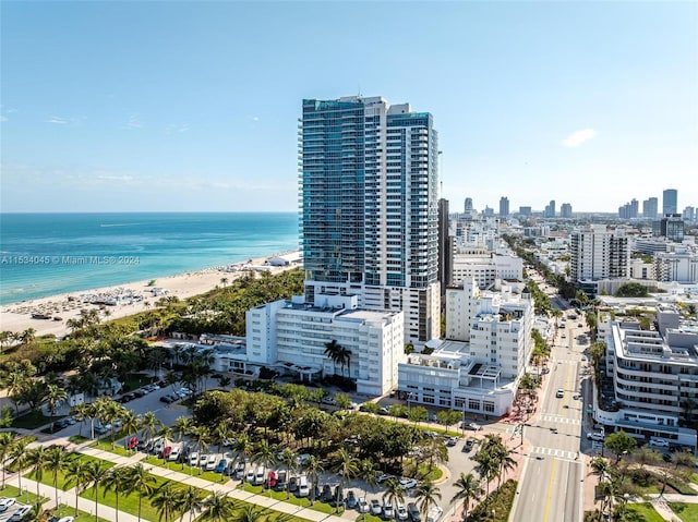 drone / aerial view with a view of the beach and a water view