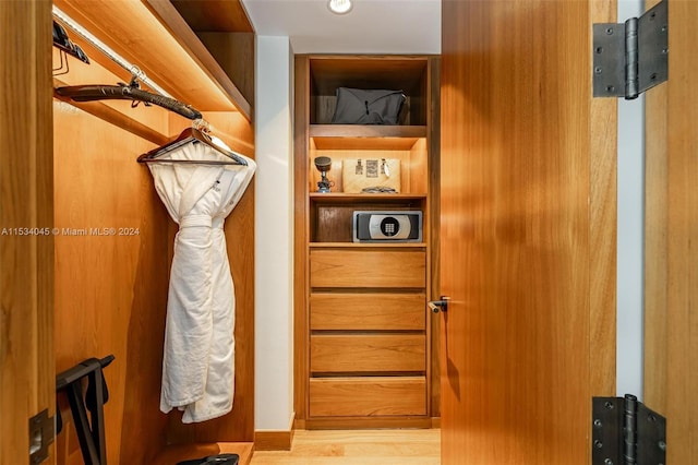 walk in closet featuring light wood-type flooring